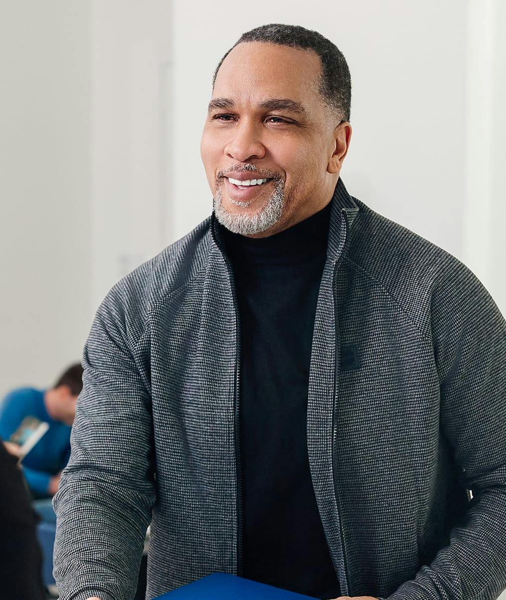 Man in a gray sweater