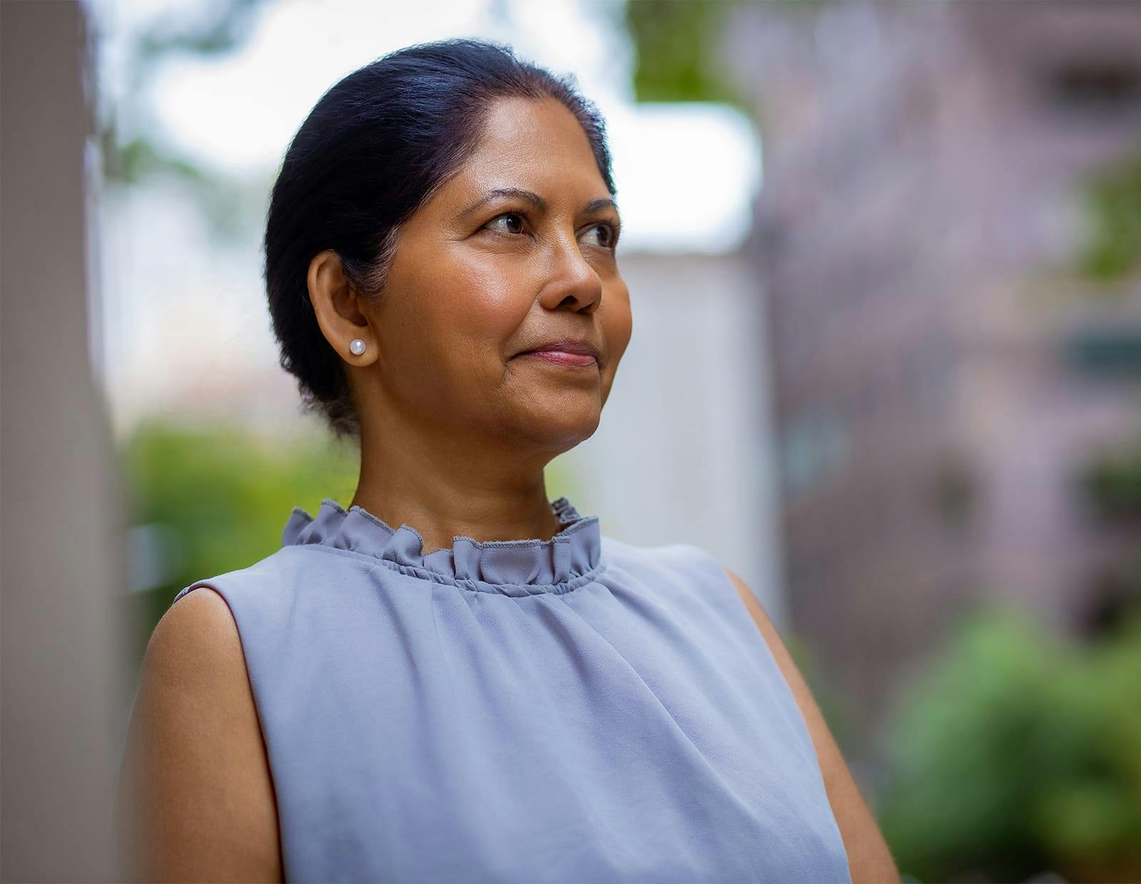Patient outside a building looking away from camera