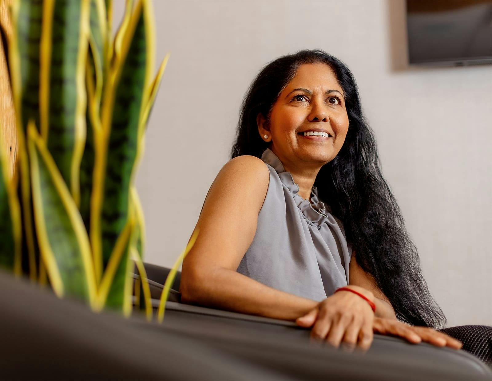 Smiling patient while seated in medical office