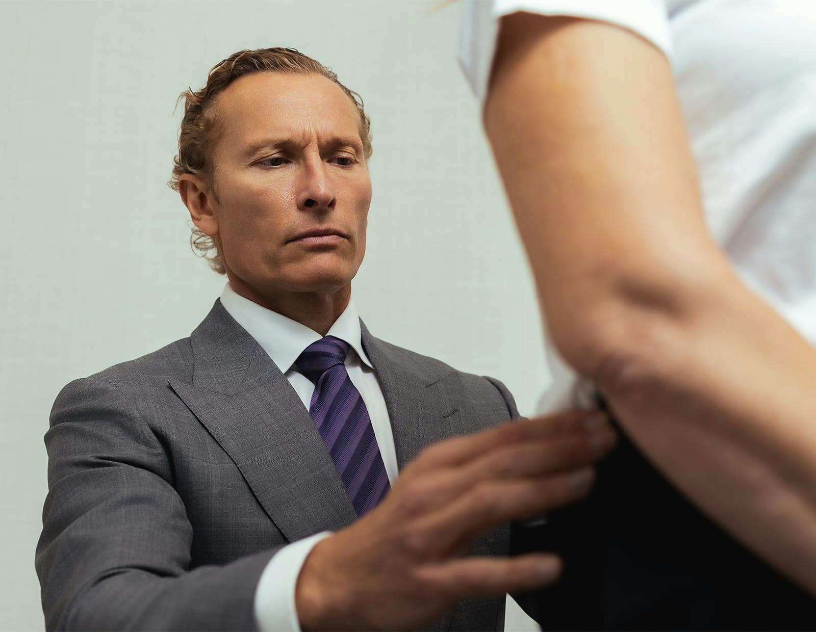 Dr. Gerling examining a patient's lower back