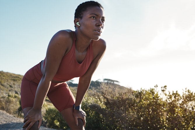 Woman taking a break from running