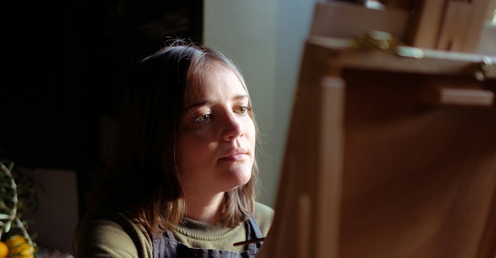 Woman Painting at Easel