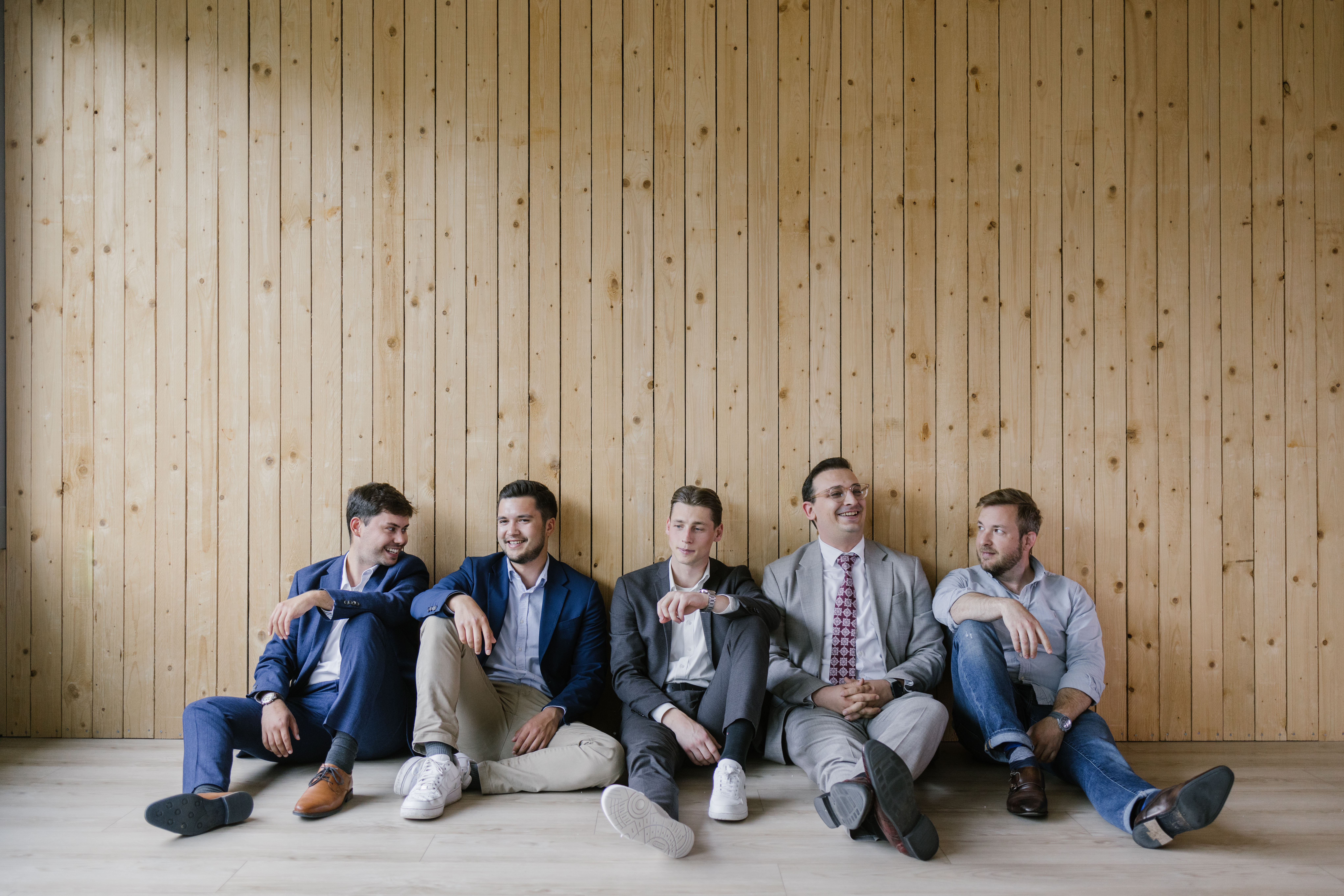 Colleagues Working Together Sitting In Tiles