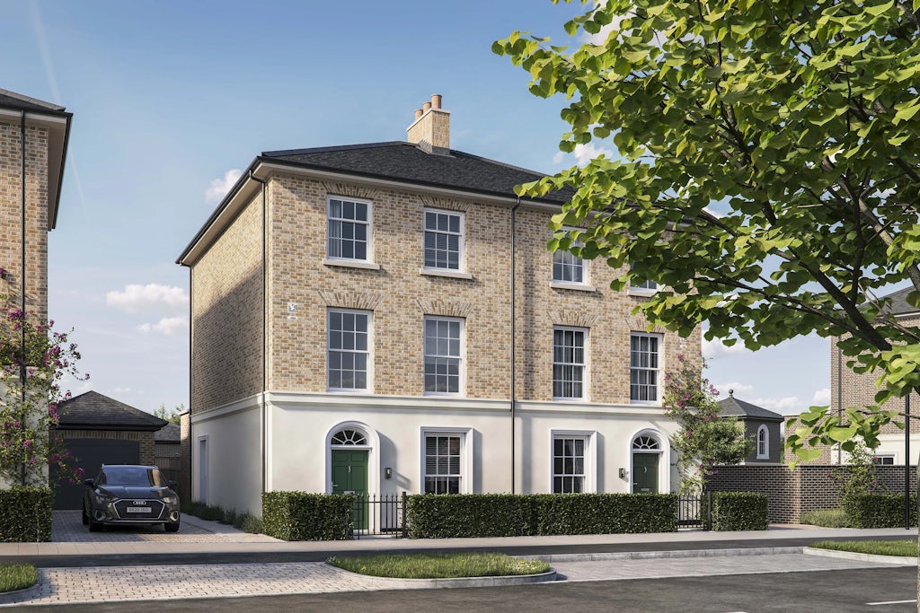 CGI image of the Grosvenor house type by Thakeham at Welborne. Two semi detached three storey Georgian style homes in exposed brick with modern sash windows.