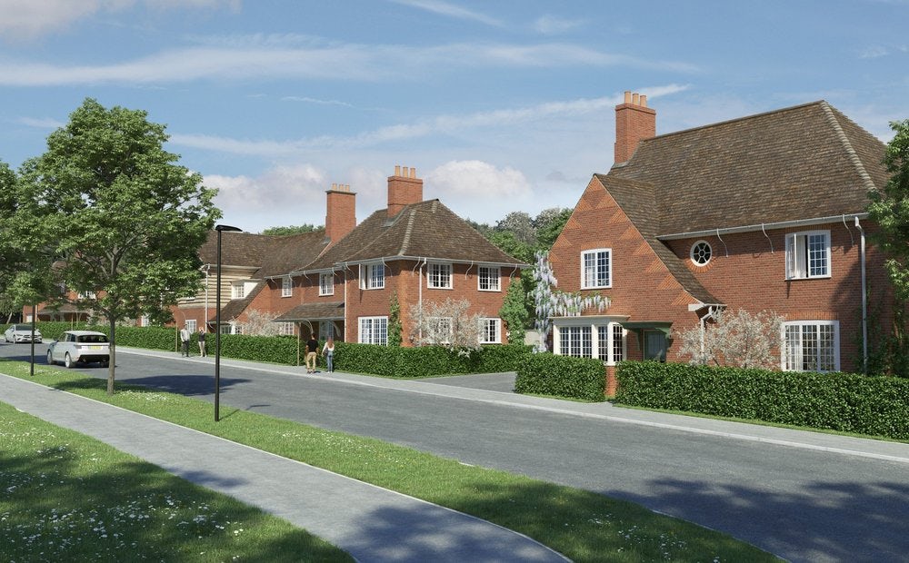 CGI of Welborne Garden Village. A quiet residential street lined with red-brick houses featuring pitched roofs and chimneys. Green hedges frame the front gardens, and trees stand along the sidewalk. A car is parked on the left side, while a few pedestrians stroll under a mostly clear sky with a few clouds.