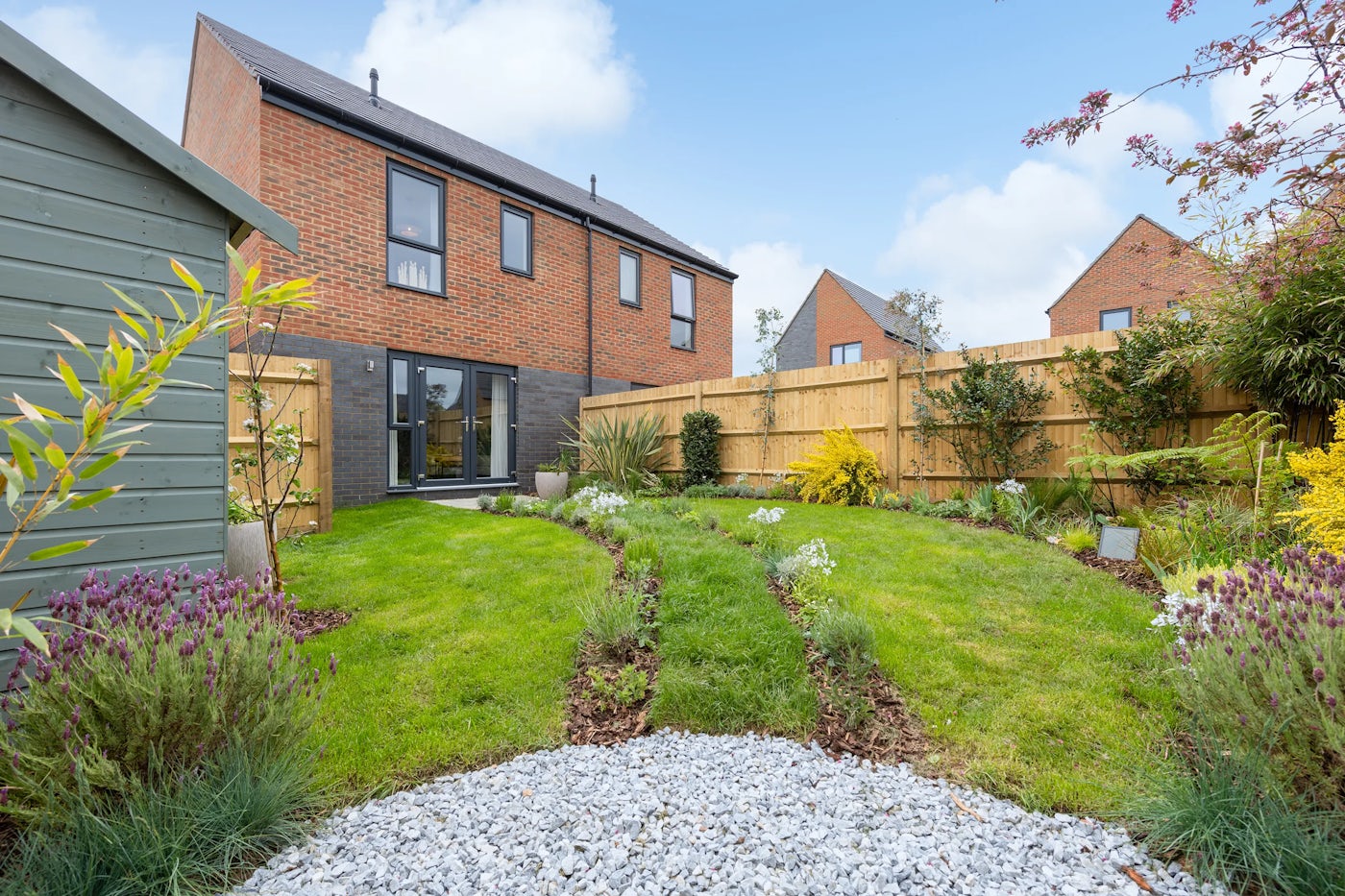 A back garden of a new build home that has been planted to encourage wildlife.