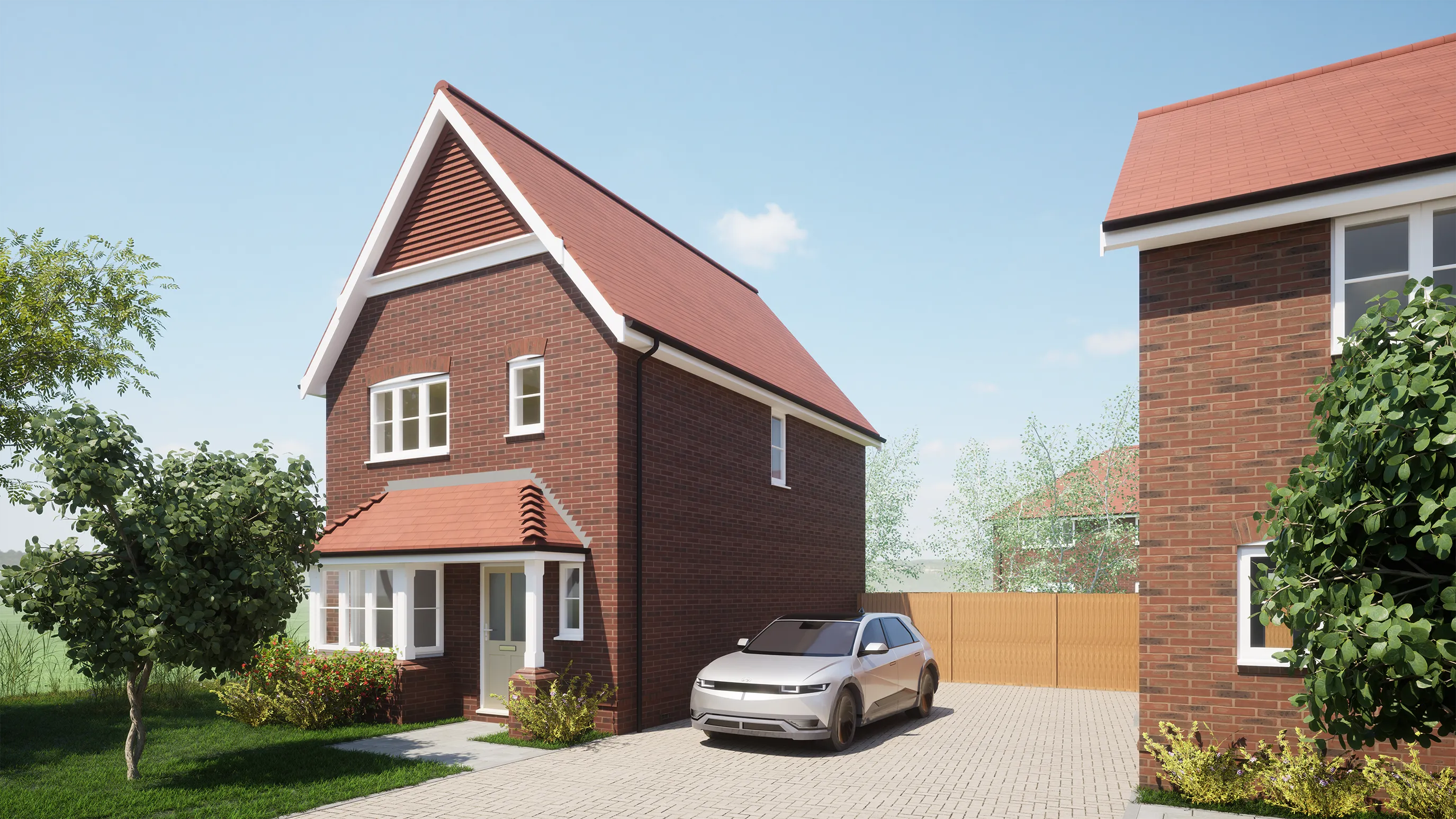 CGI of A suburban home with red brick walls and a triangular red roof sits in the foreground, featuring a small porch and white-framed windows. A silver car is parked in the driveway, which is paved with light-colored bricks. Trees and bushes surround the house, adding greenery to the scene. In the background, another house with similar architecture is partially visible. The sky is clear with a few clouds, suggesting a sunny day.
