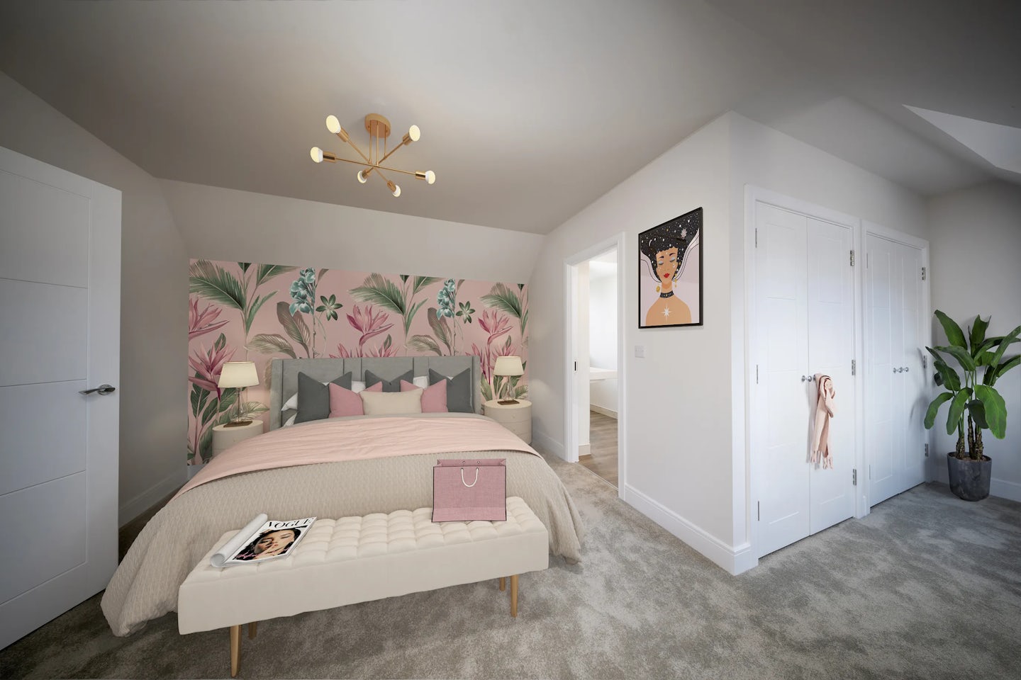 A modern, softly lit bedroom featuring a bed with a pale pink bedspread and layered cushions in blush and beige tones. Behind the bed, floral wallpaper in muted pink and green adds a gentle, nature-inspired accent. Each bedside table holds a lamp with a warm glow. A blush-coloured handbag and open magazine rest on a cushioned bench at the foot of the bed, suggesting a calm, lived-in feel. A leafy green plant stands in the corner, balancing the warm textures with freshness. Two doors on the right hint at an en-suite and storage space, while a sleek ceiling light and framed wall art complete the room’s stylish, serene design.