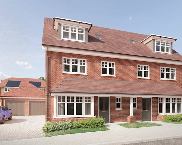 A CGI of a semi-detached, three-storey brick house with a red-tiled roof and dormer windows, located in a suburban neighbourhood. Each unit has a separate front door, large ground-floor windows, and a small landscaped garden with shrubs. A blue car is parked on the driveway beside a detached garage, under a clear, lightly clouded sky.