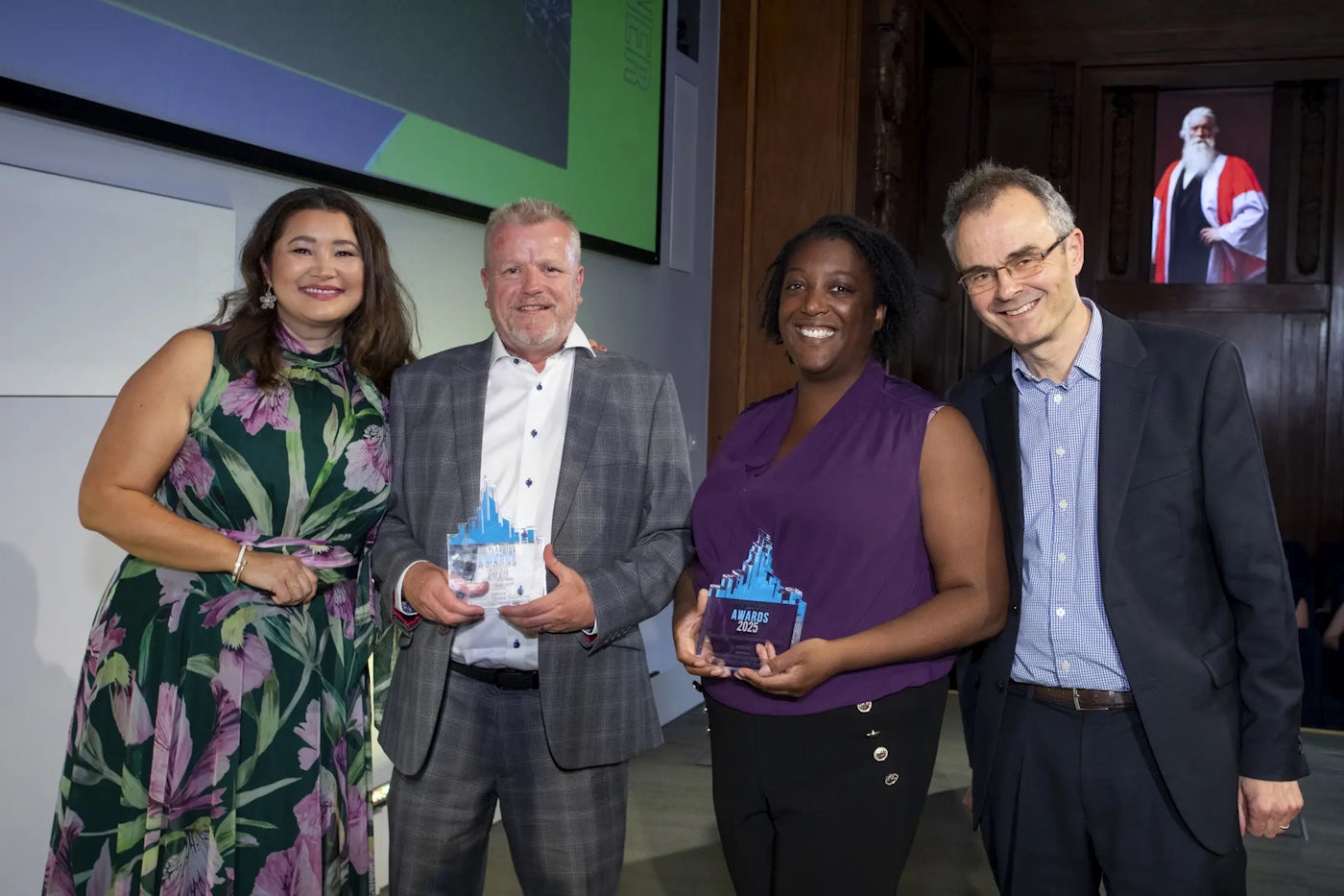 Thakeham colleagues collect trophies for Woodgate at he 2025 planning awards.