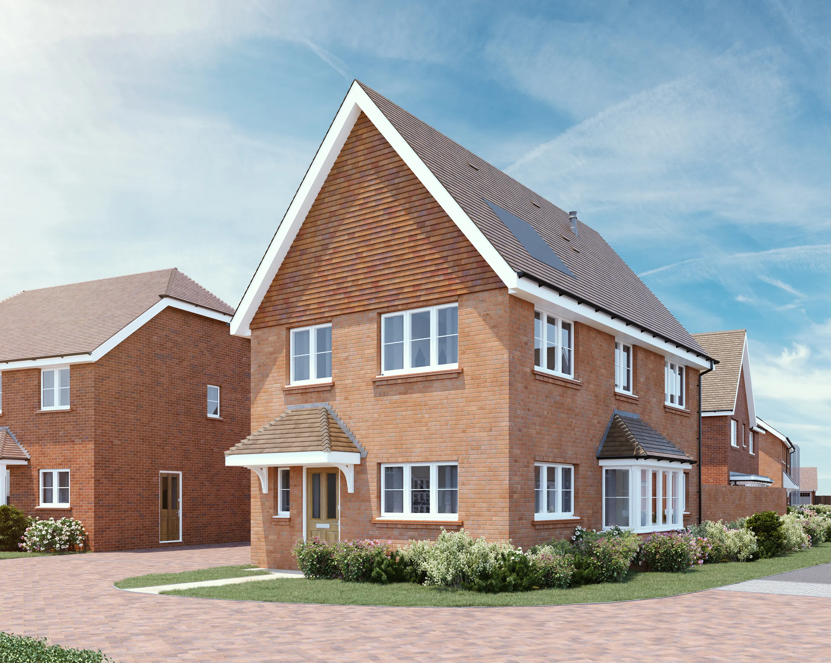 CGI of a modern suburban home with a red brick exterior and pitched roof, featuring white-framed windows and a wooden front door beneath a small porch with white columns. The house is set within a neatly maintained front garden bordered by low hedges, with a paved driveway leading to the side. A neighboring two-story house stands nearby, and the sky above is clear with wispy clouds, casting bright daylight over the peaceful residential scene