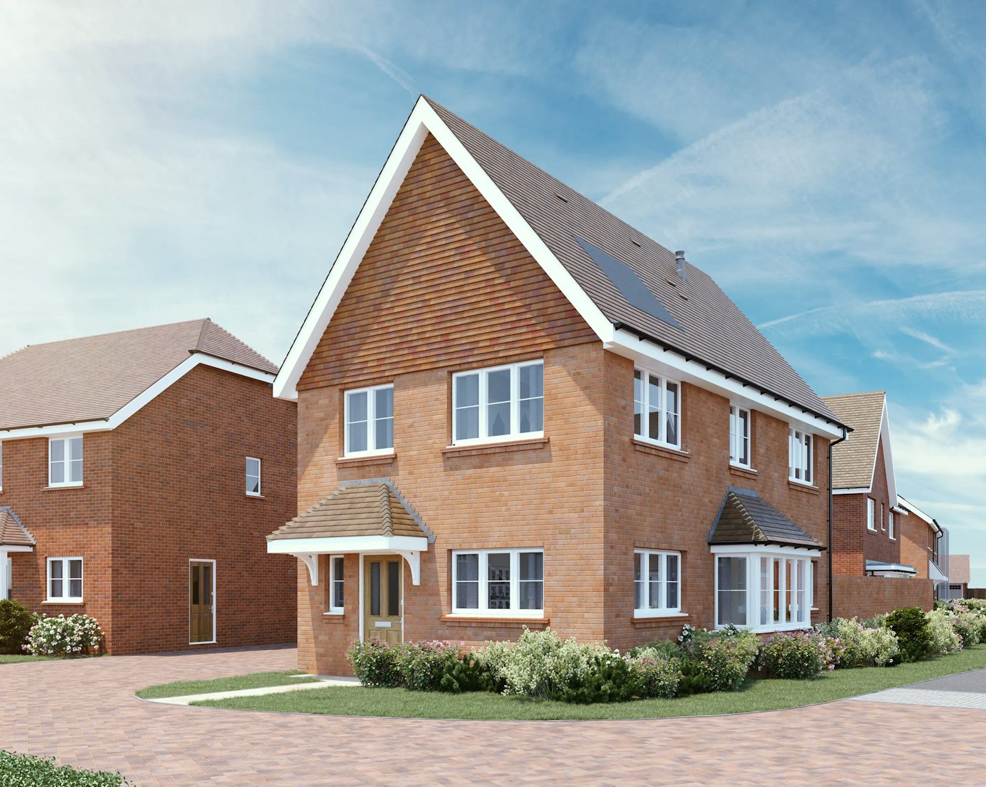 CGI of a modern suburban home with a red brick exterior and pitched roof, featuring white-framed windows and a wooden front door beneath a small porch with white columns. The house is set within a neatly maintained front garden bordered by low hedges, with a paved driveway leading to the side. A neighboring two-story house stands nearby, and the sky above is clear with wispy clouds, casting bright daylight over the peaceful residential scene