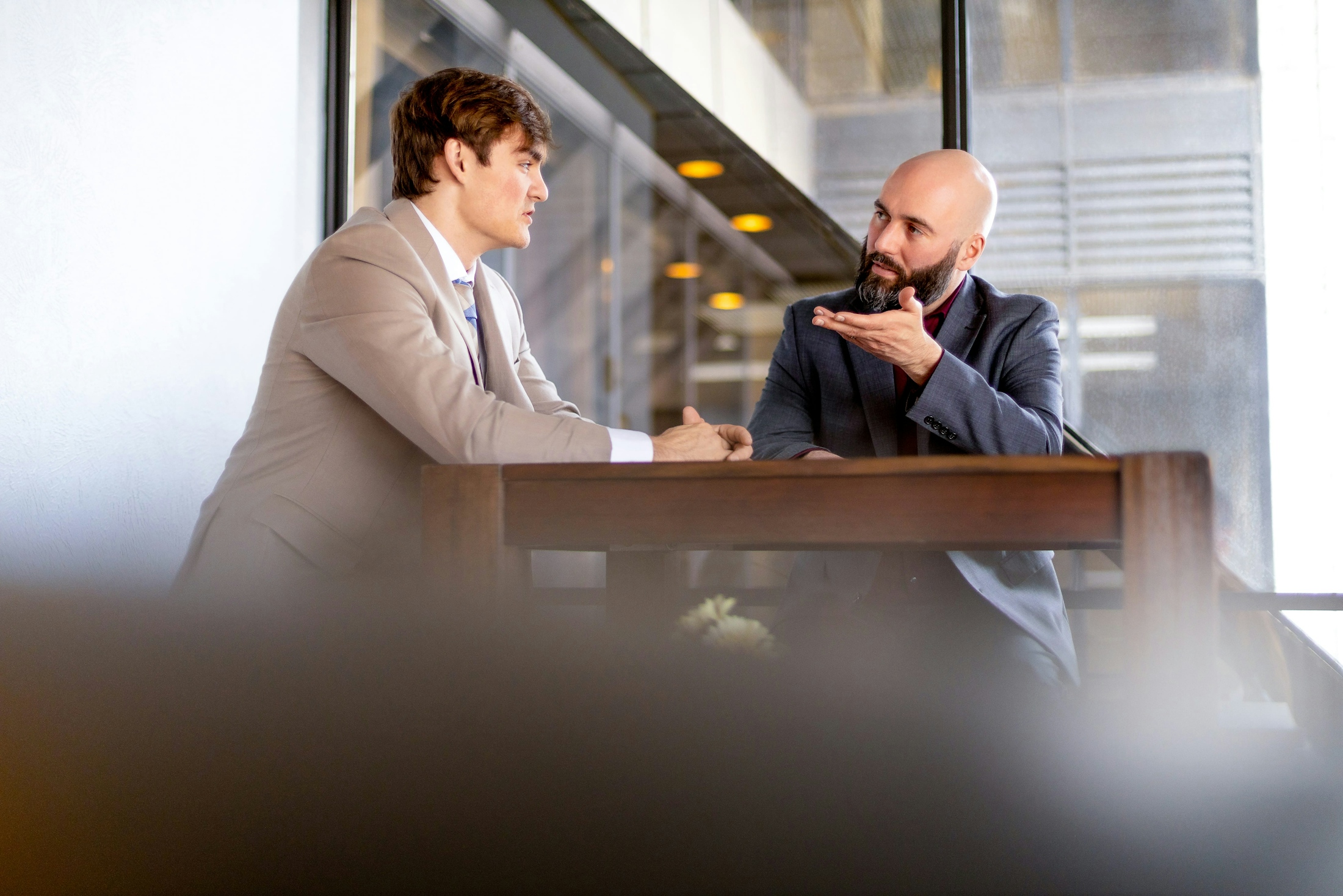 Juvenile Criminal Cases Banner - Robert J. Hanauer Speaking to Juvenile Client
