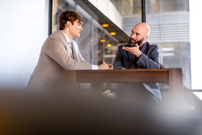 Juvenile Criminal Cases Banner - Robert J. Hanauer Speaking to Juvenile Client