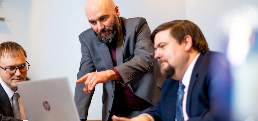 Robert J. Hanauer & Christopher A. Nelson Viewing a Laptop - Parentage And Paternity Banner