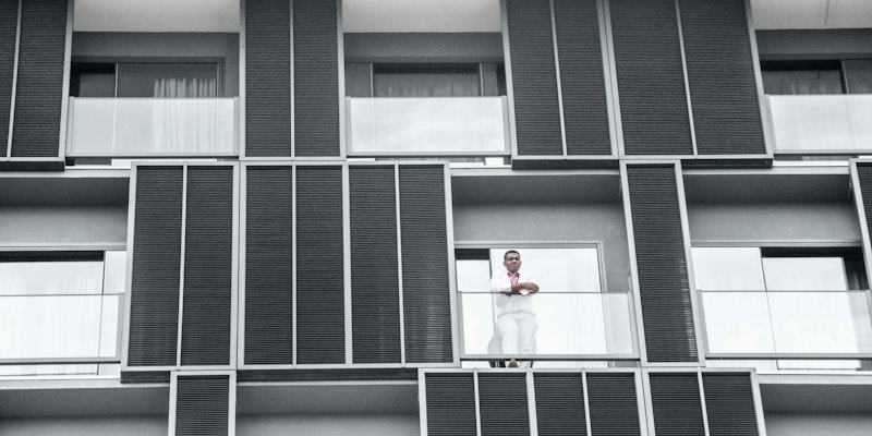 man standing on terraice