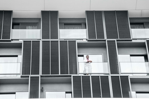 man standing on terraice