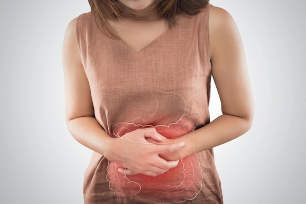 Imagem de uma pessoa com as mãos no abdomen, indicando diarreia e necessidade de tomar Imosec.