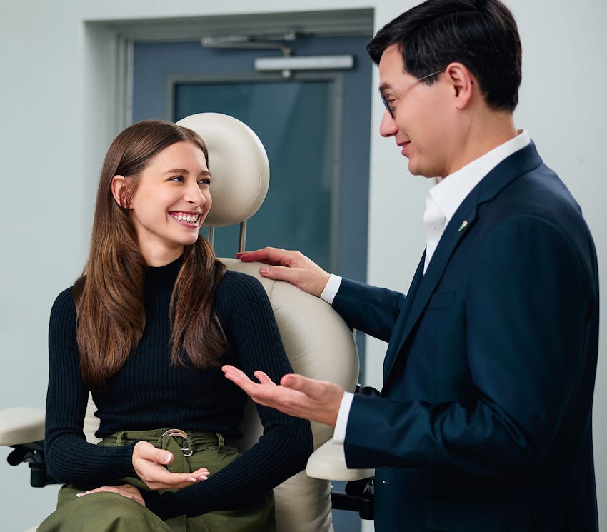 Dr. Leong speaking with patient