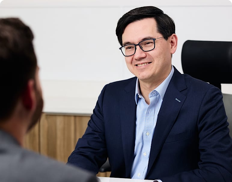 Dr. Leong working with a patient