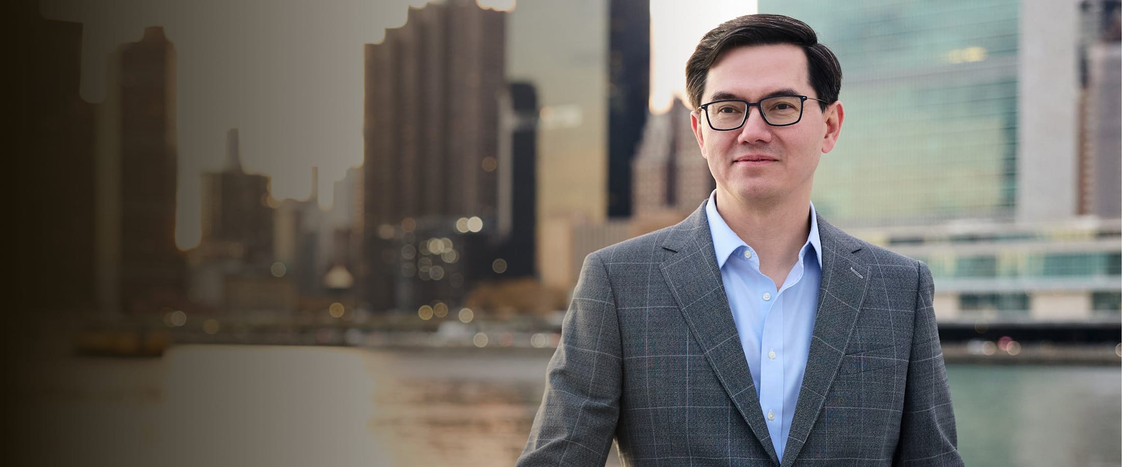 Dr. Leong in front of a river