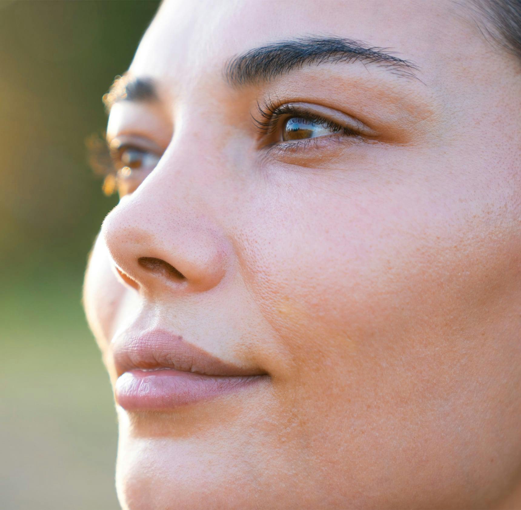 woman with brown eyes smiling