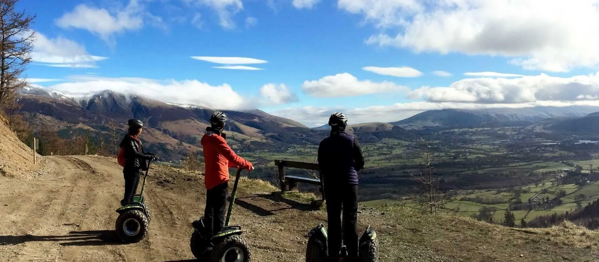 People on Segways looking at the view.