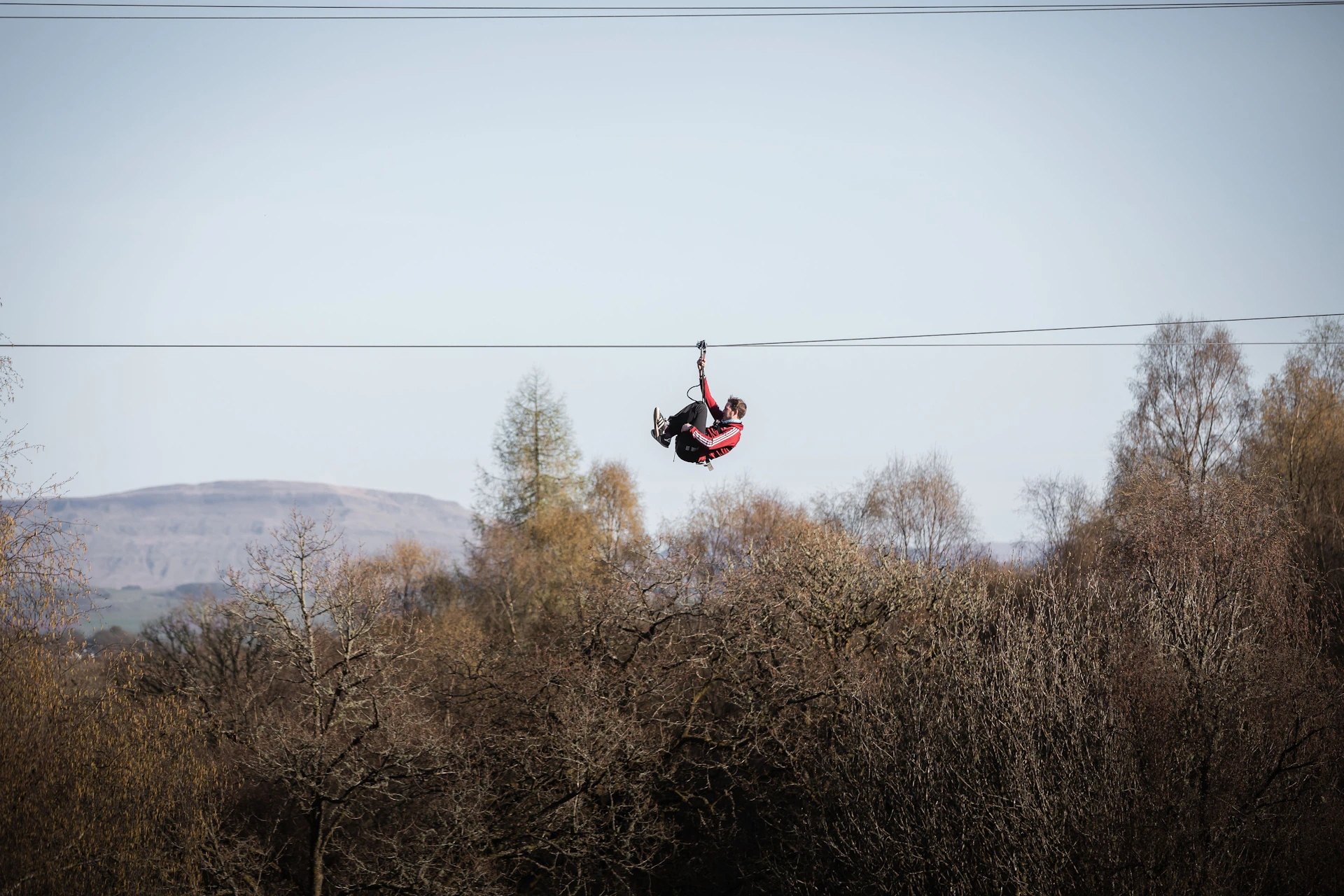 Person on a zipline.