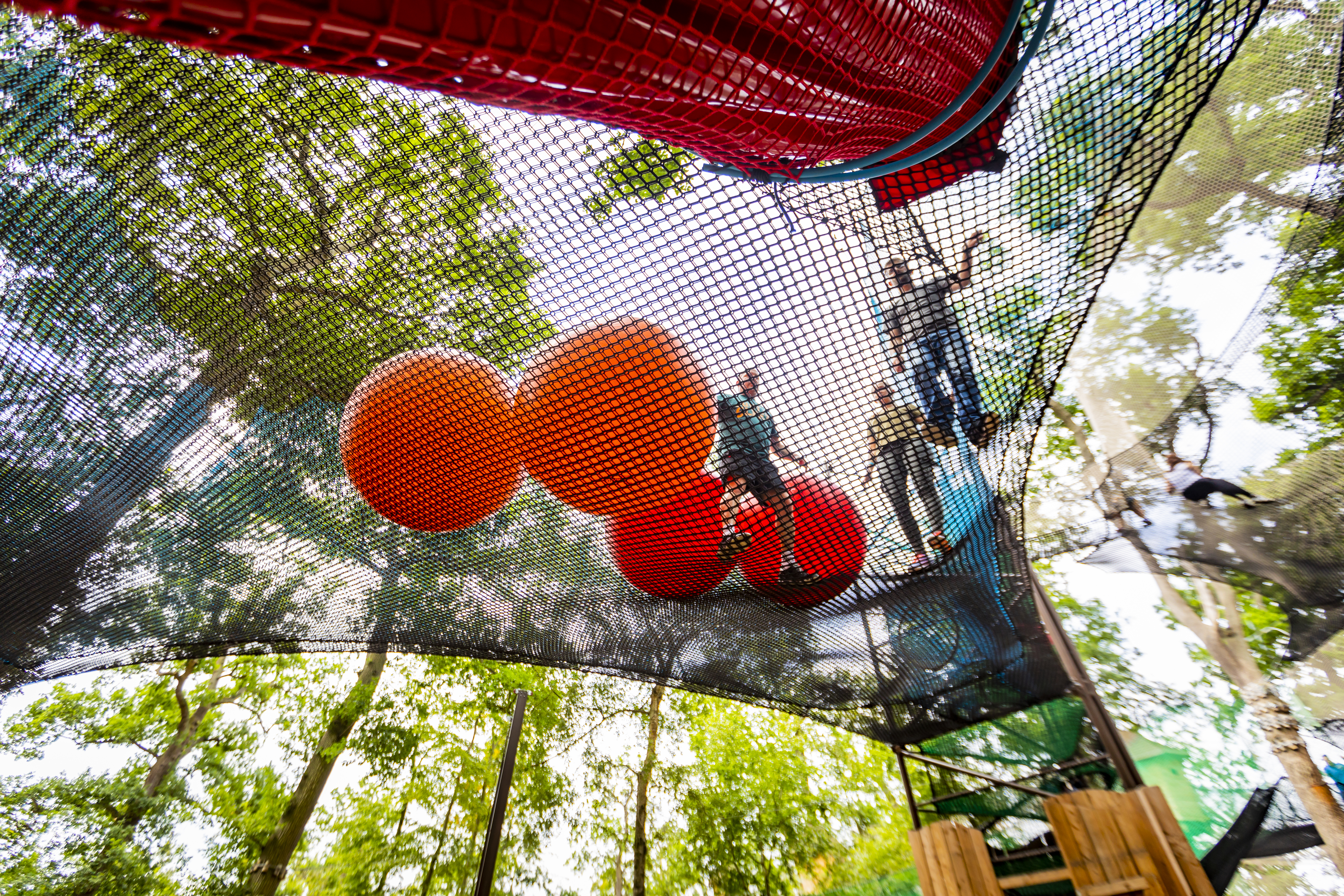 Large nets above with people on them.