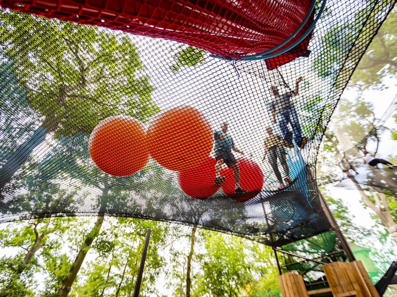 Large nets above with people on them.
