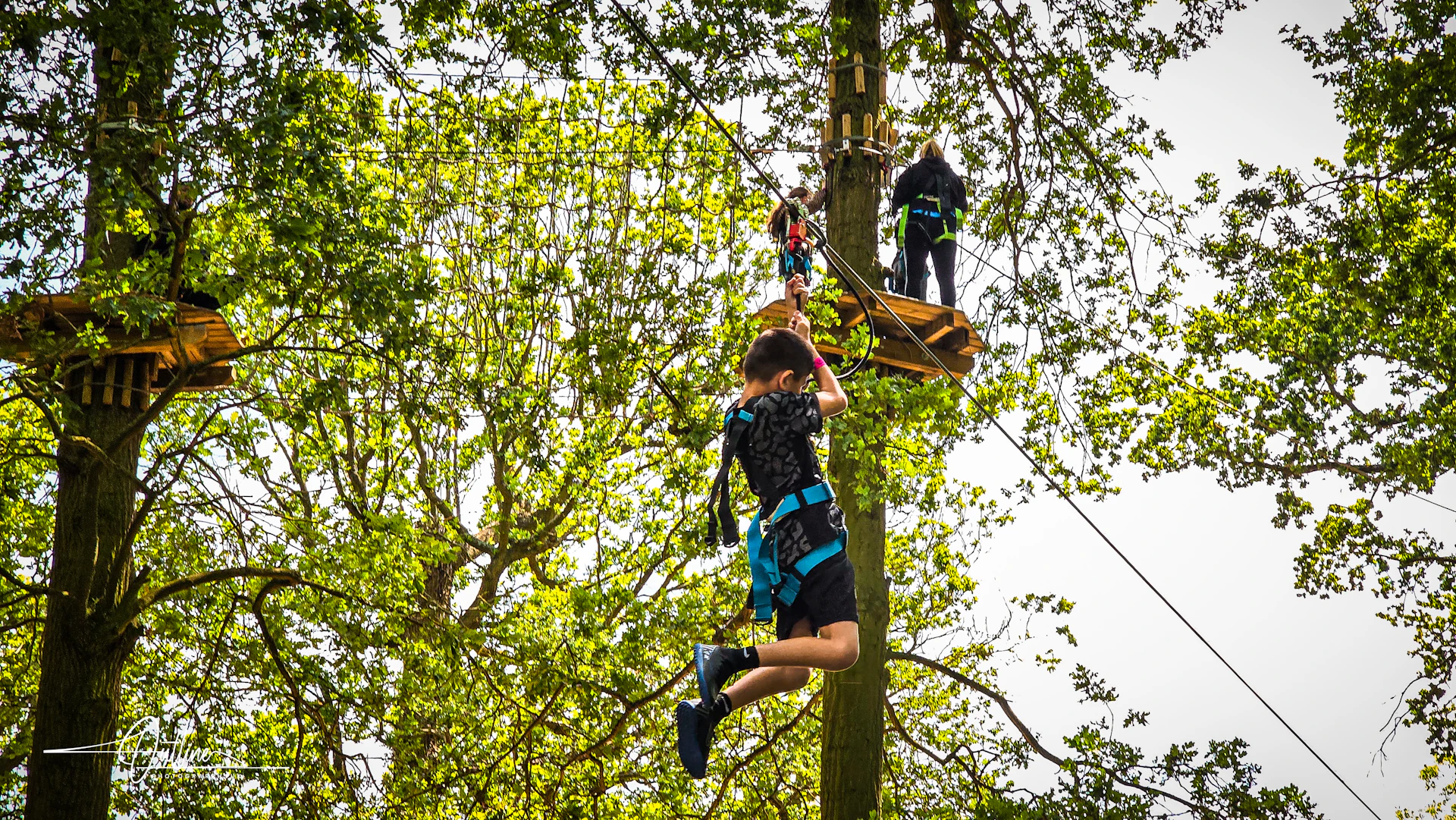 Young person on a zipline.