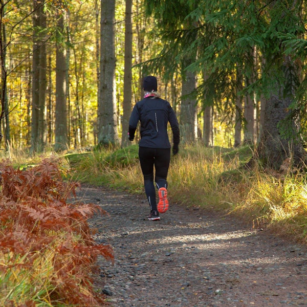 A person running through the forest