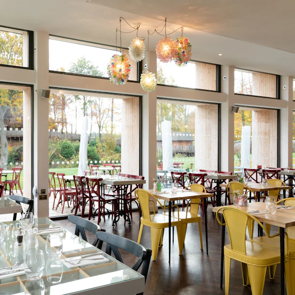 Tables laid for service at a restaurant