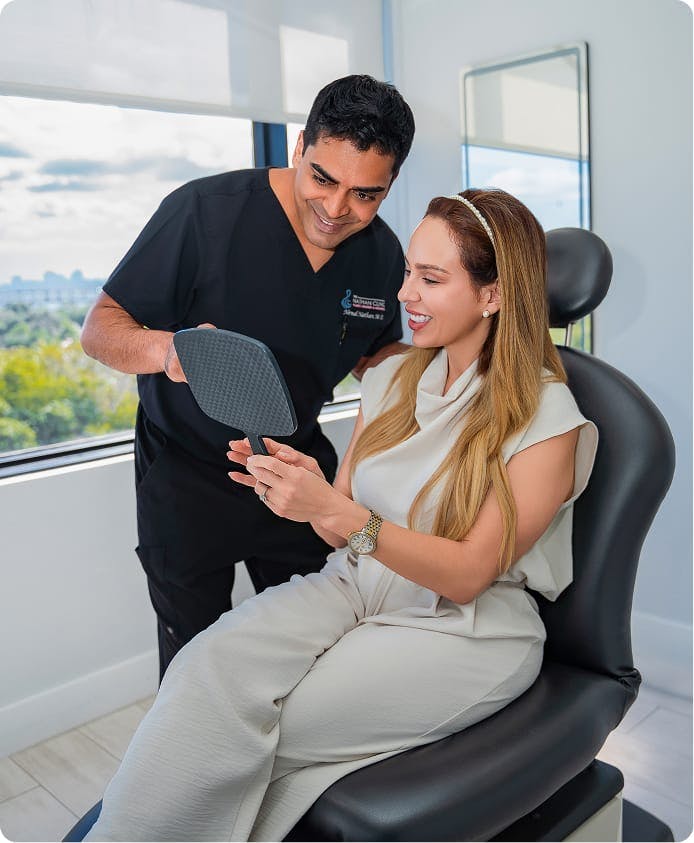 Dr. Nathan working with a patient