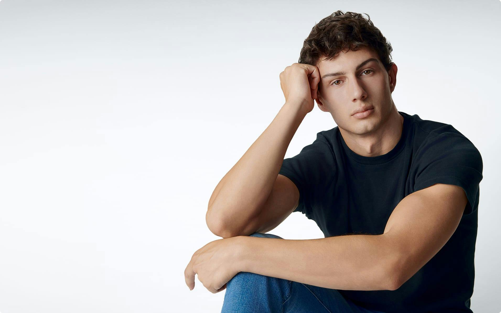 Man sitting and looking forward