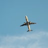 Plane flying over MET