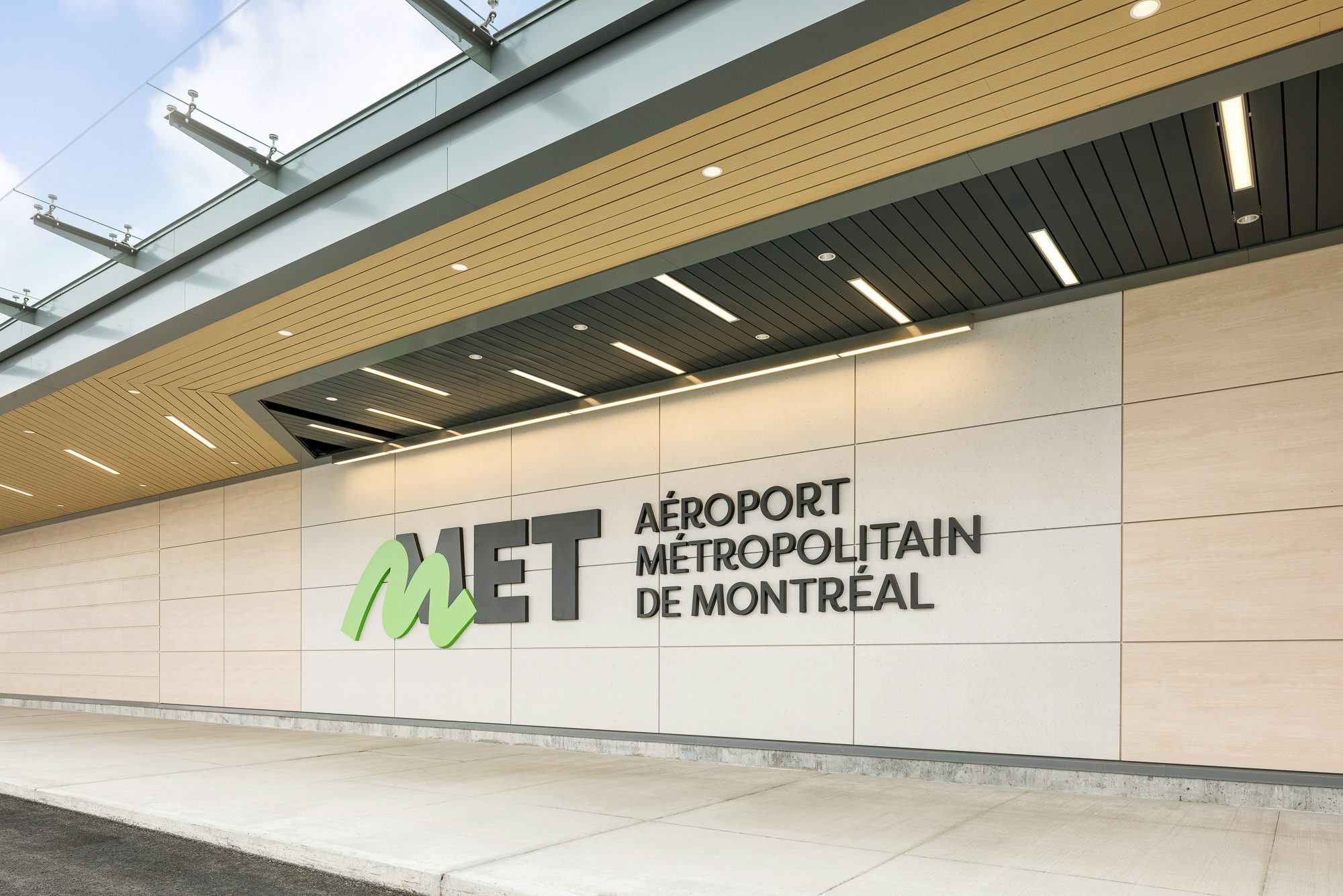 MET – Montréal Metropolitan Airport sign on the exterior wall of the terminal