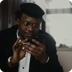 A man reading from his phone