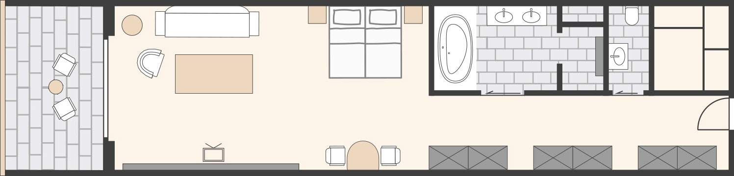 Plan de la suite senior de la Sarine chambre à coucher avec salon, salle de bains avec baignoire, WC séparé, balcon