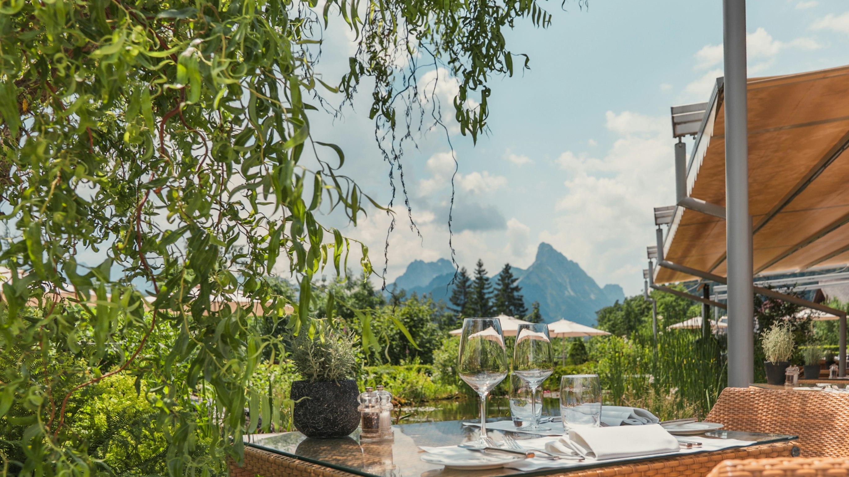 Terrace Ermitage Set table on terrace with view of mountain