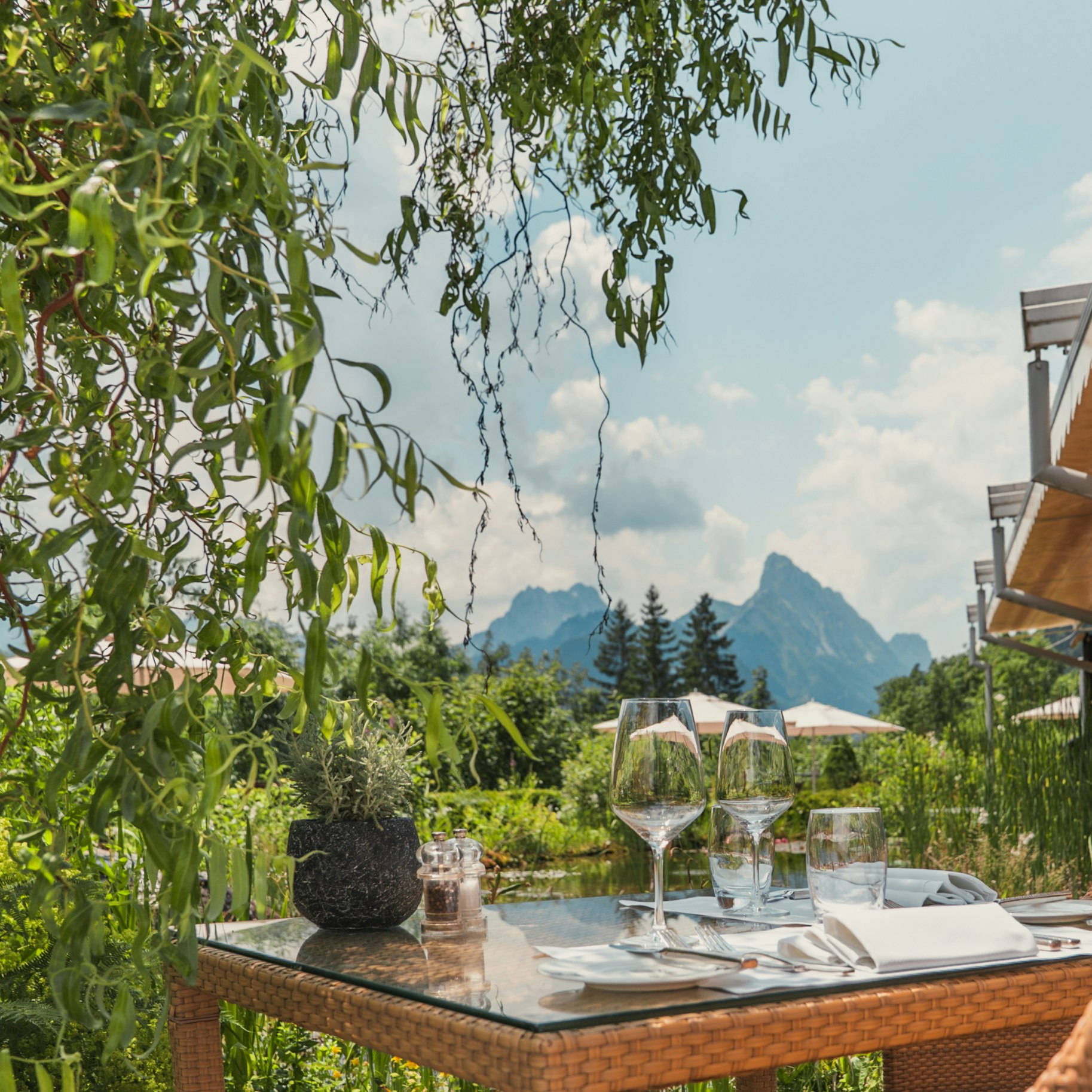 Terrace Ermitage Set table on terrace with view of mountain