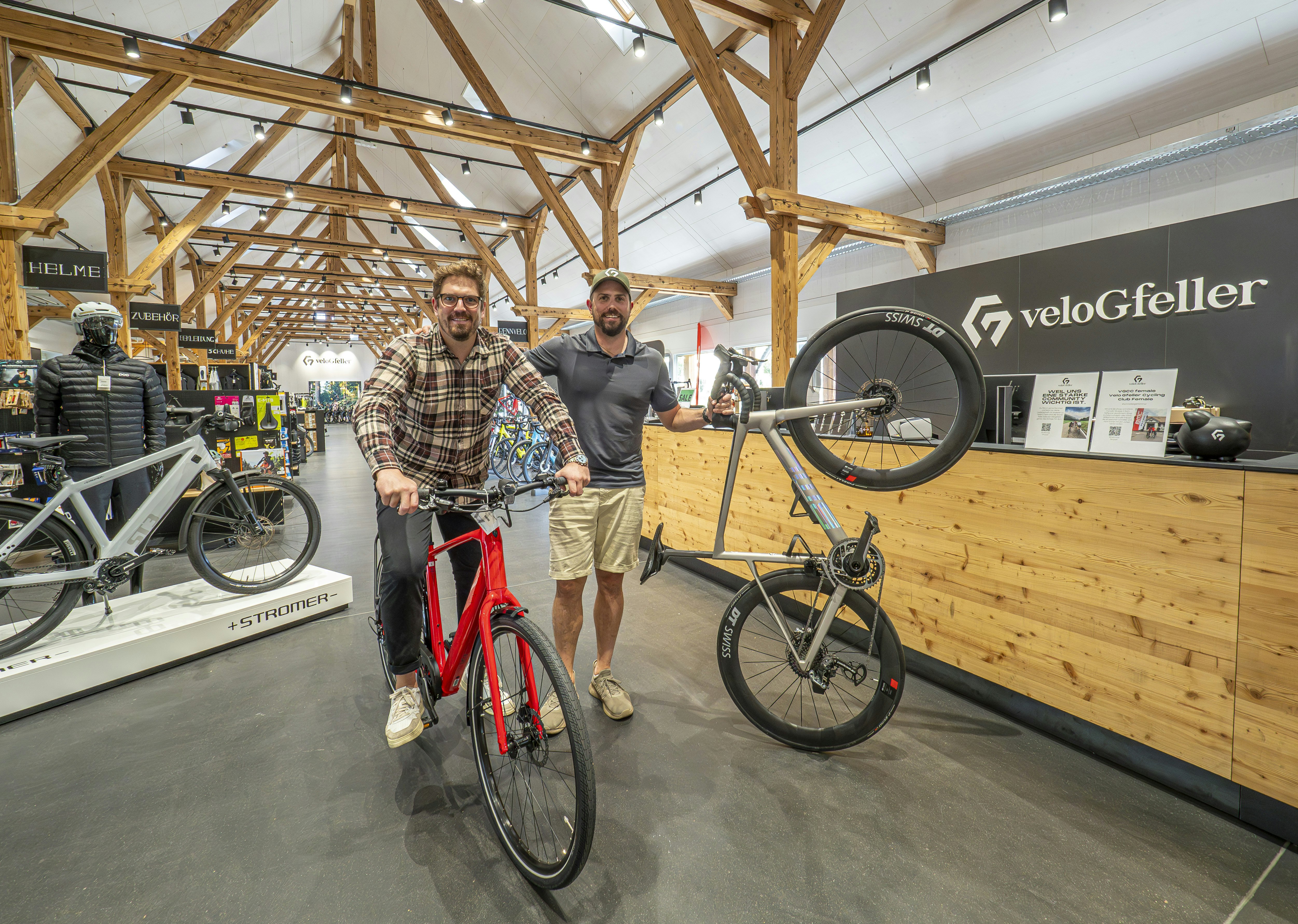 Two men with two bikes