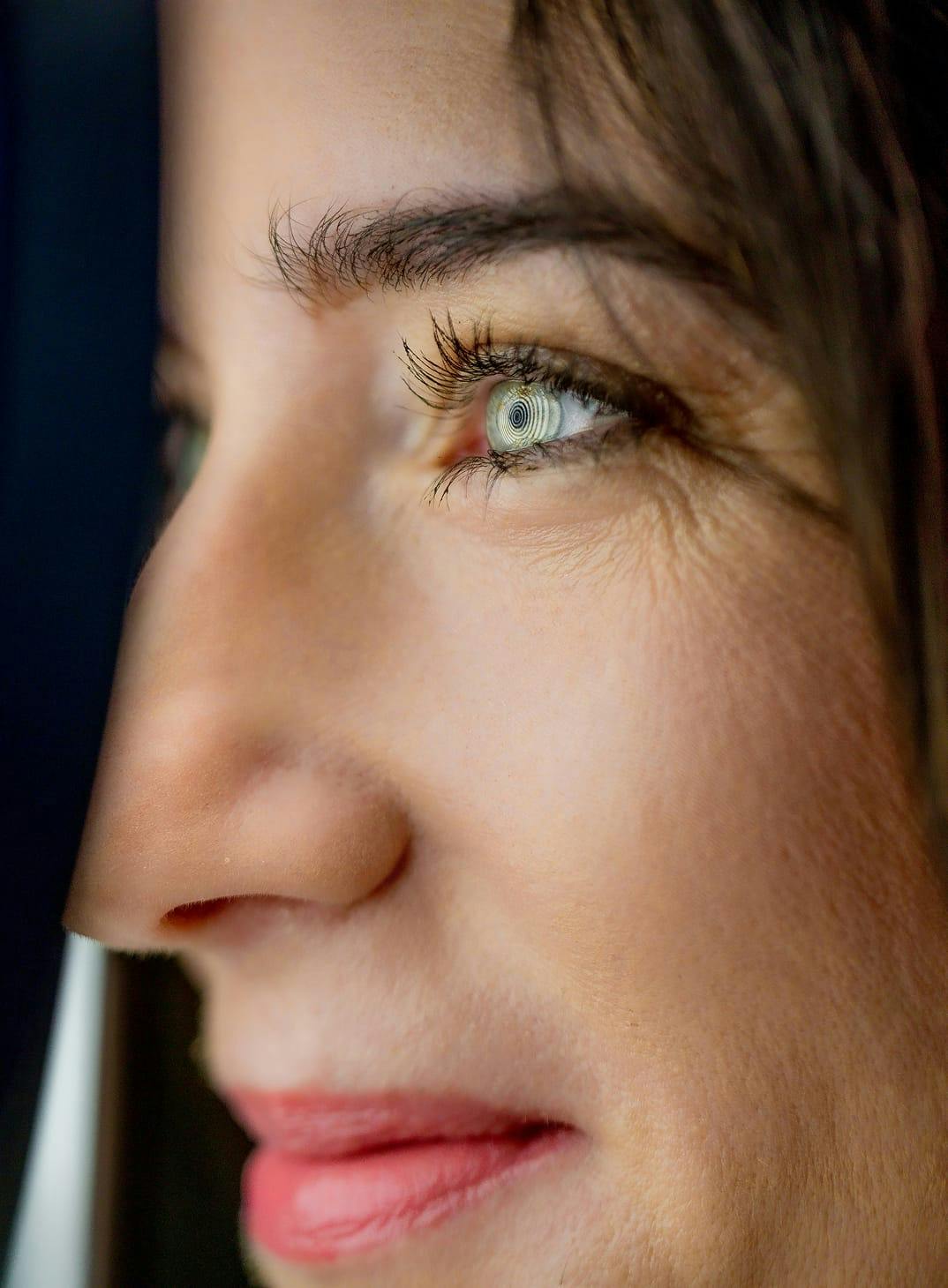 Female patient undergoing comprehensive eye examination