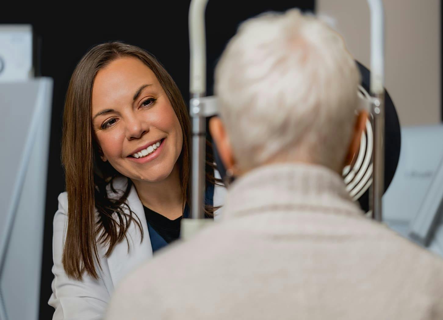 patient getting their eyes checked by eye doctor