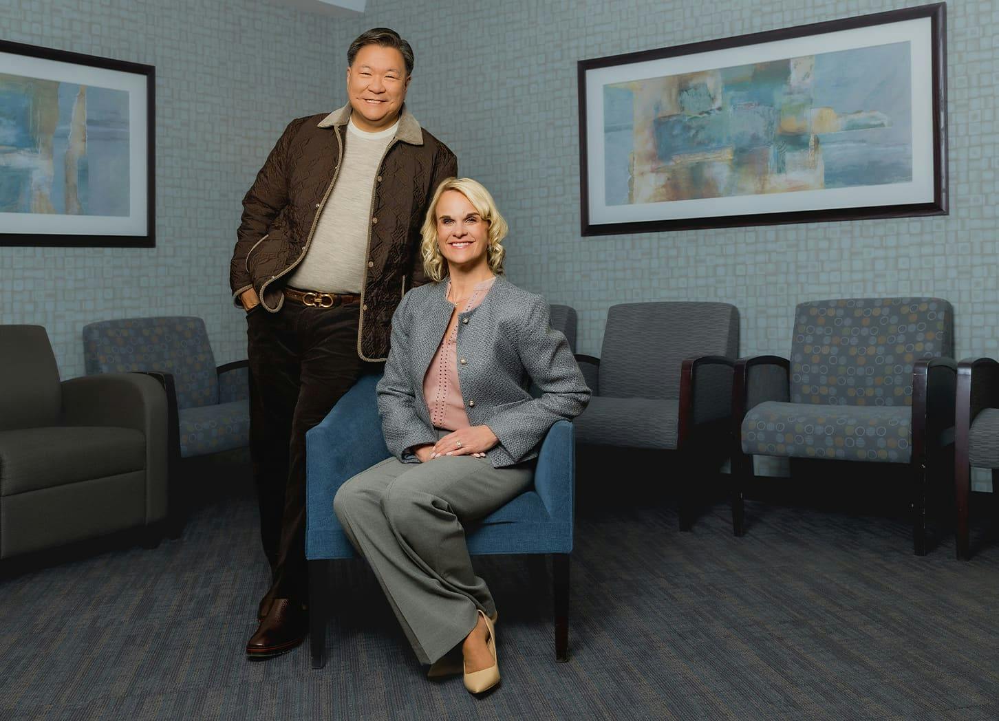 Dr. Chu with staff smiling