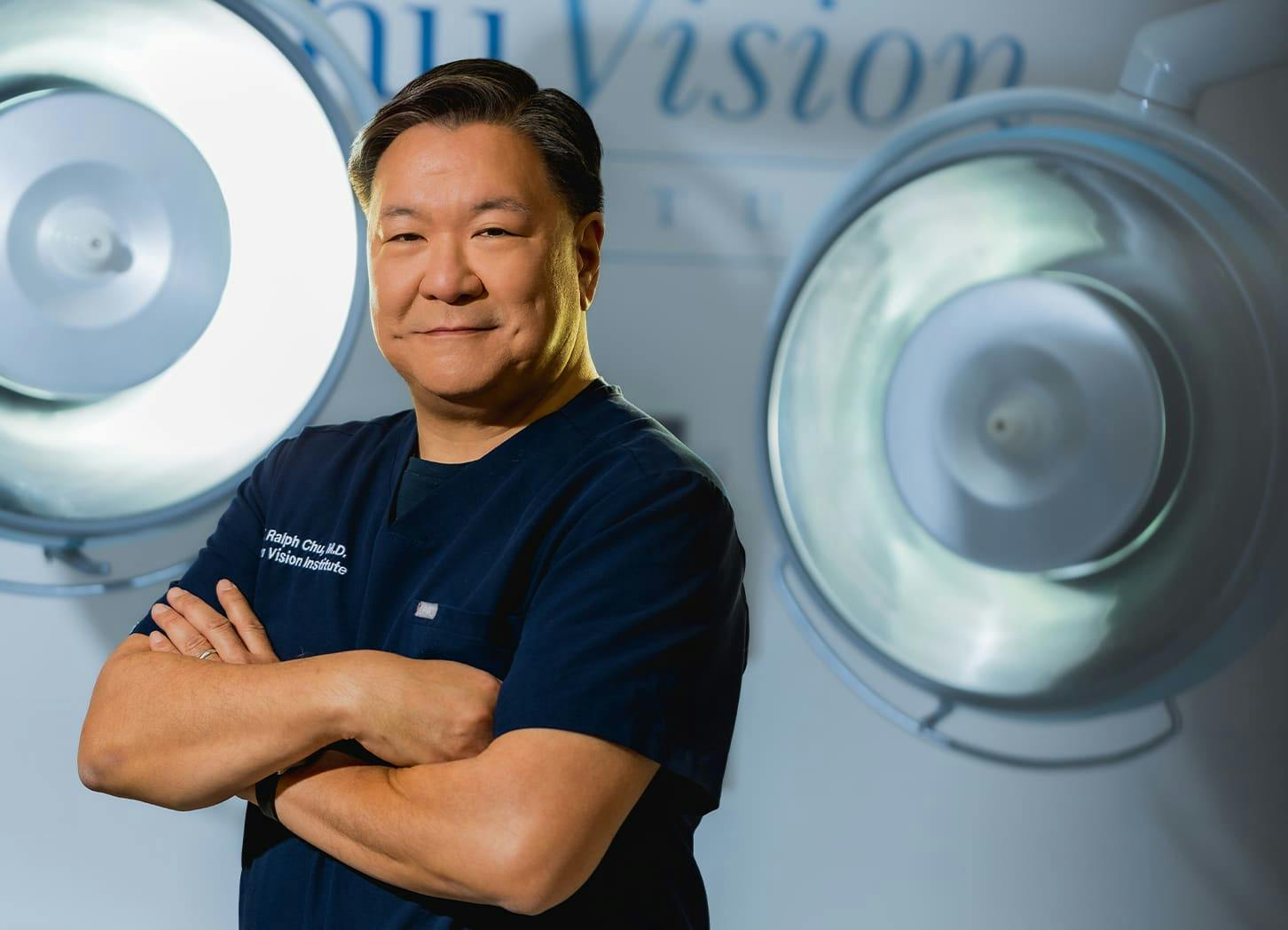 Dr. Chu with his arms crossed