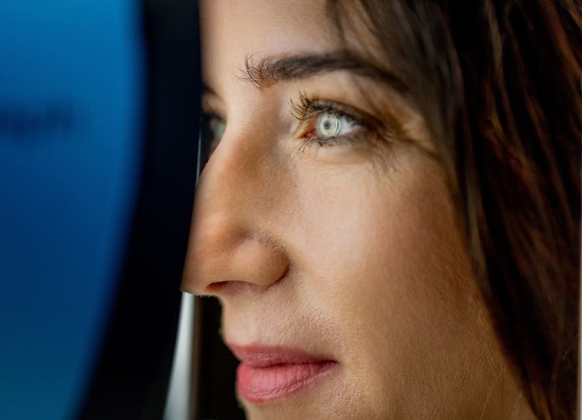 close up on woman's face to the side