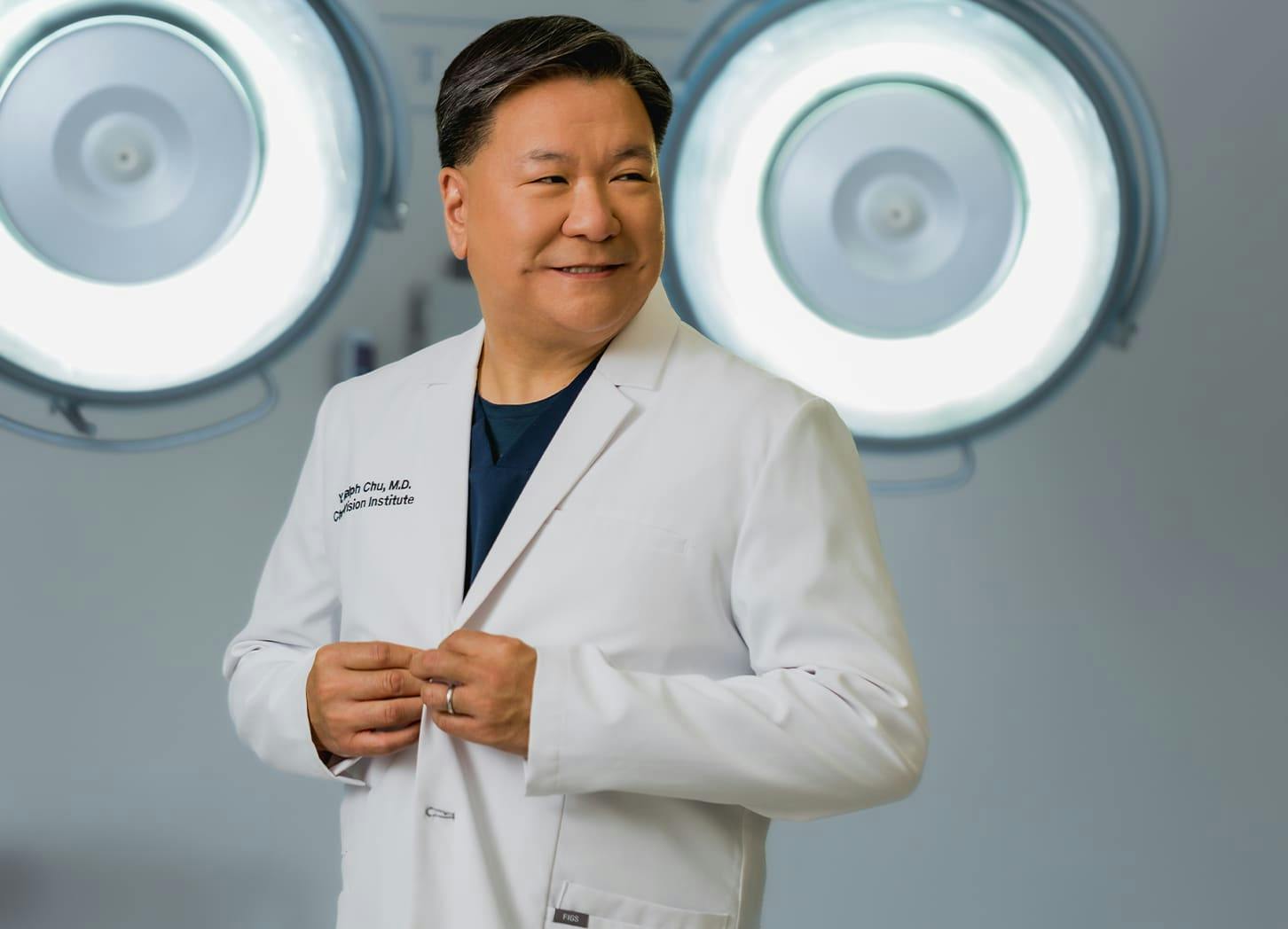 Dr. Chu with doctor lab coat on