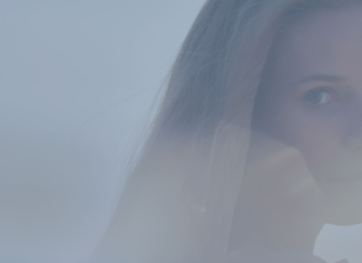 blurred view of a woman