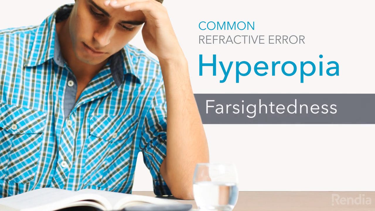 man reading booklet with hand on his forehead